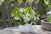 White bouquet of Convallaria (Lily of the Valley) and woodruff