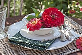 Table decoration with zinnias