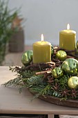 Advent wreath made of mixed coniferous green, decorated