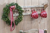Buxus (Box) wreath with ribbon and red cups