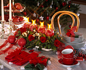 Advent arrangement as table decoration with pine cones