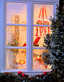 Looking through a window in a festively decorated room