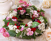 Wreath on wirreif with Syringa (lilac), Rosa (Rose)