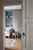 View of blue fitted cupboards in child's bedroom