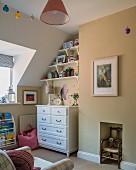 White chest of drawers in child's bedroom