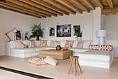 Large sofa in Mediterranean living room in pale shades