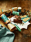 Chocolate and dried fruit rolls in Christmas cracker wrappings