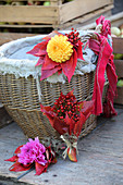 Posy of dahlias, rose hips and red Virginia creeper leaves