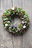 Romantic Easter wreath with quail eggs and snake's head fritillaries