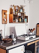 A minimalist kitchen with a concrete worktop