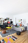 Eclectic mix of styles and graphic patterns in living room