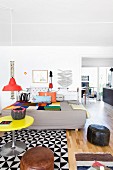 Eclectic mix of styles and graphic patterns in living room