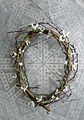Wreath of woven willow twigs and snowdrops