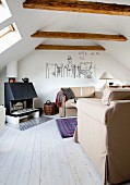 Attic living room with sofas against opposite walls
