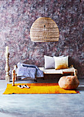 Basket light over an oriental day bed