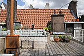 Bench and stove on roof terrace