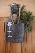 Felt bag decorated with Edelweiss and sprig of pine