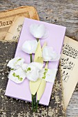 Paper flowers on card gift box