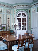 Historical dining room with painted walls in stately home