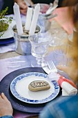 Name written on pebble on place setting
