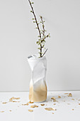 Gold and white vase hand-made from crumpled can