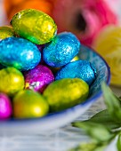 Chocolate eggs wrapped in colourful foil