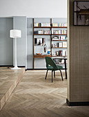 Spit-level interior with partition wall and herringbone parquet floor