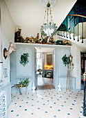Panelled walls and hunting trophies in classic foyer