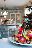 Fruit bowl in festive dining room