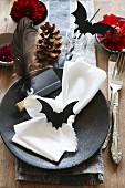 Halloween table decorated with hand-made paper bats
