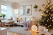 Cosy festive ambience in white living room