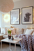 Cosily lit living room with wintry accessories