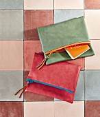 DIY clutches made of colourful faux leather