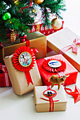 Wrapped gifts with photo tags and rosettes
