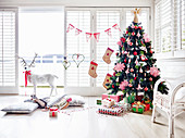 Decorated Christmas tree in a white ambience