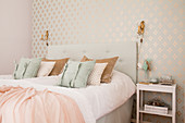 Elegant bedroom in pastel and champagne shades