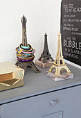 Three small Eiffel Towers used as jewellery racks and ornaments