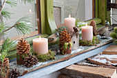 Small Advent and winter decoration in front of window