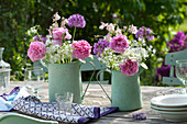 Bouquets made of pink (rose), allium (ornamental) and aquilegia