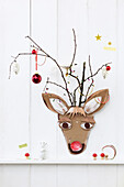 DIY Rudolph made from cardboard with twig antlers