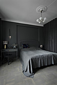 Bedroom entirely decorated in grey and black