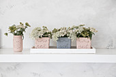 Planters made from glass jars painted with chalk paint