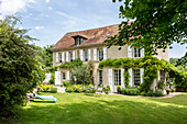 French country house with garden