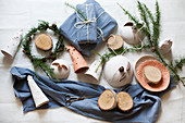 Pottery ornaments, gifts wrapped in fabric and larch twigs