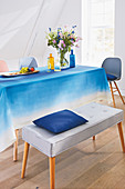 A homemade tablecloth with a blue colour gradient