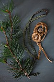 Brocade ribbon, Christmas-tree baubles and fir branch