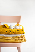 Speckled eggs on stacked linen