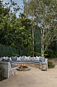 Fire pit and stone bench on terrace