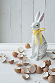 Easter bunny ornament with yellow ribbon and egg shells