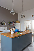 Modern country-house kitchen in blue, grey and white